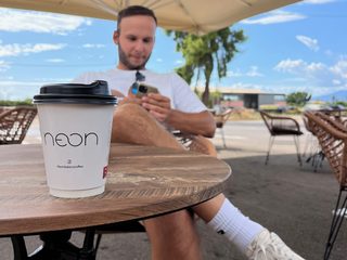 Markus in Thailand wearing Cafe on the Roast shirt, the trip that started it all